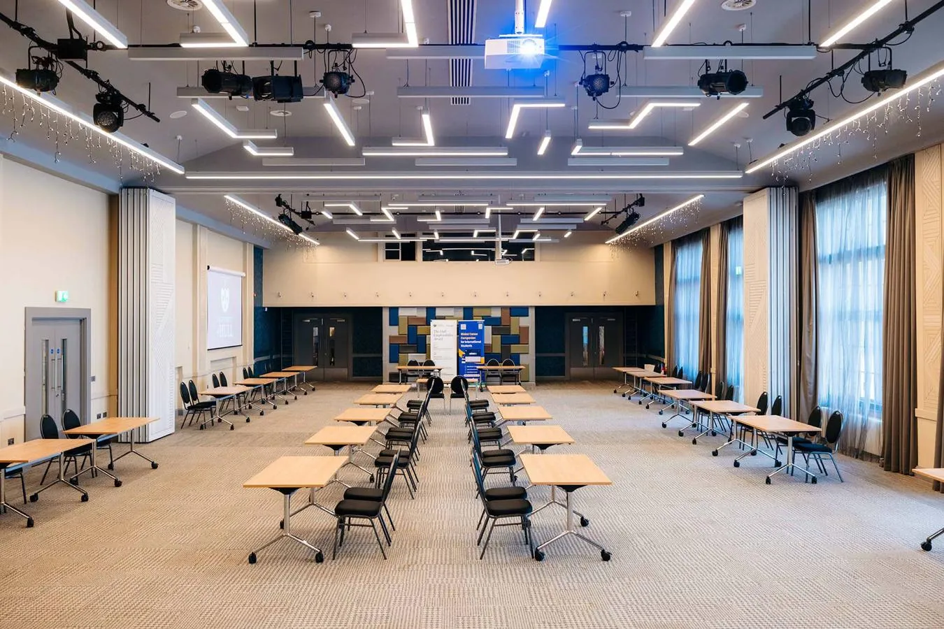 A large room lined with desks and chairs