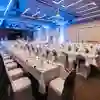A view of long banquet tables set up in the Kingsley Suite